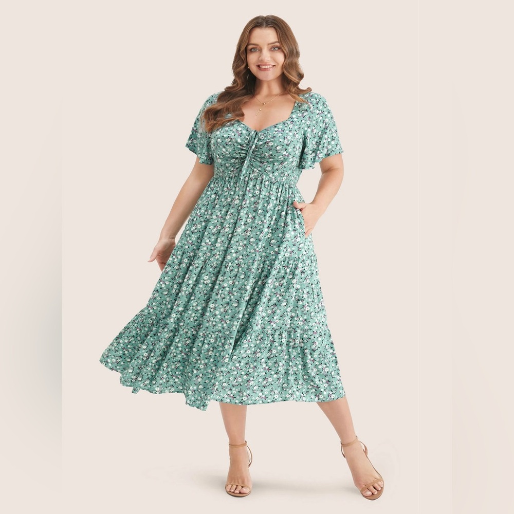Bloom Chic’s “Ditsy Floral Dress.” Light, airy, and flattering. Color:Mint